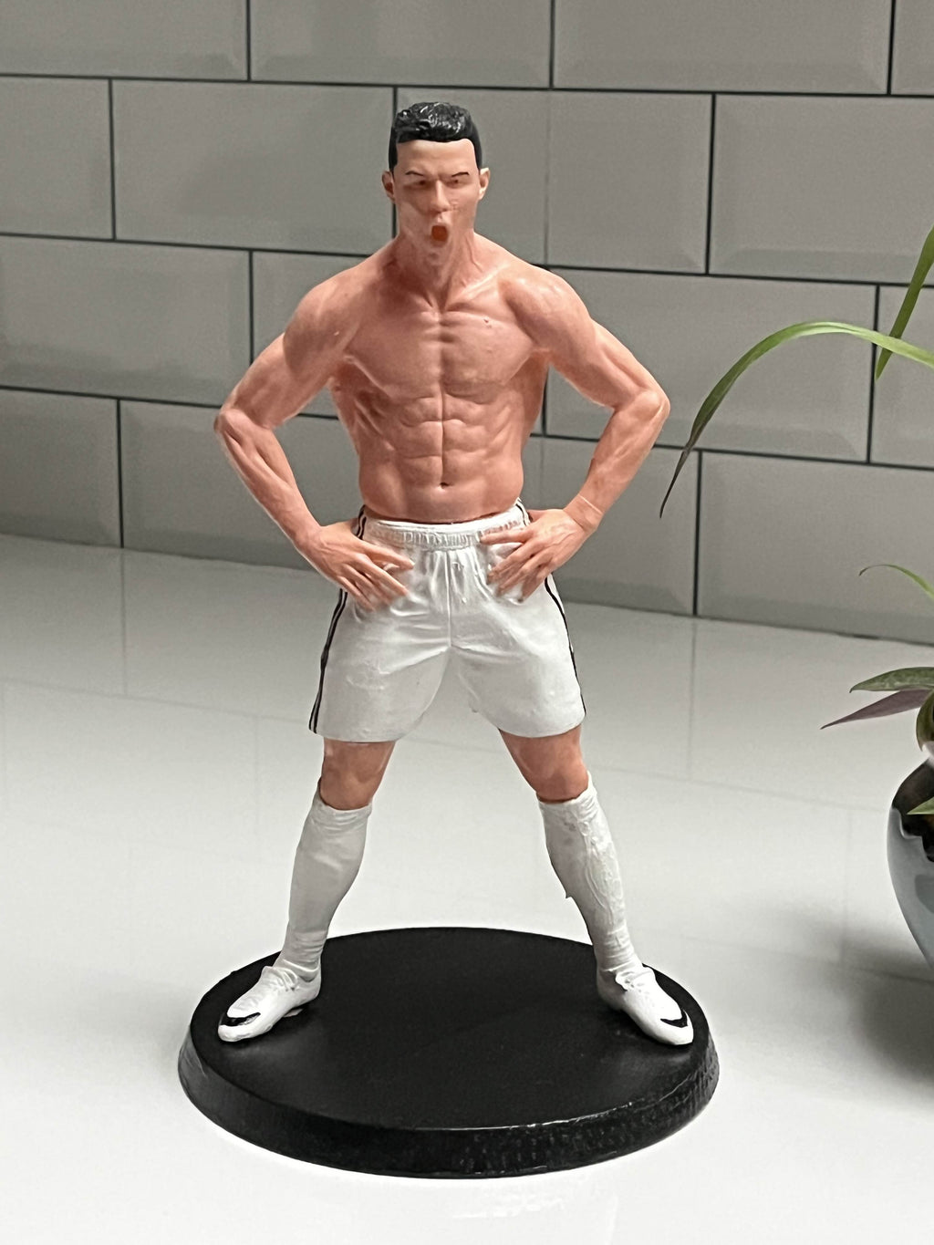 Celebration Pose Footballer Figurine – White Kit Collectible on Black Display Base