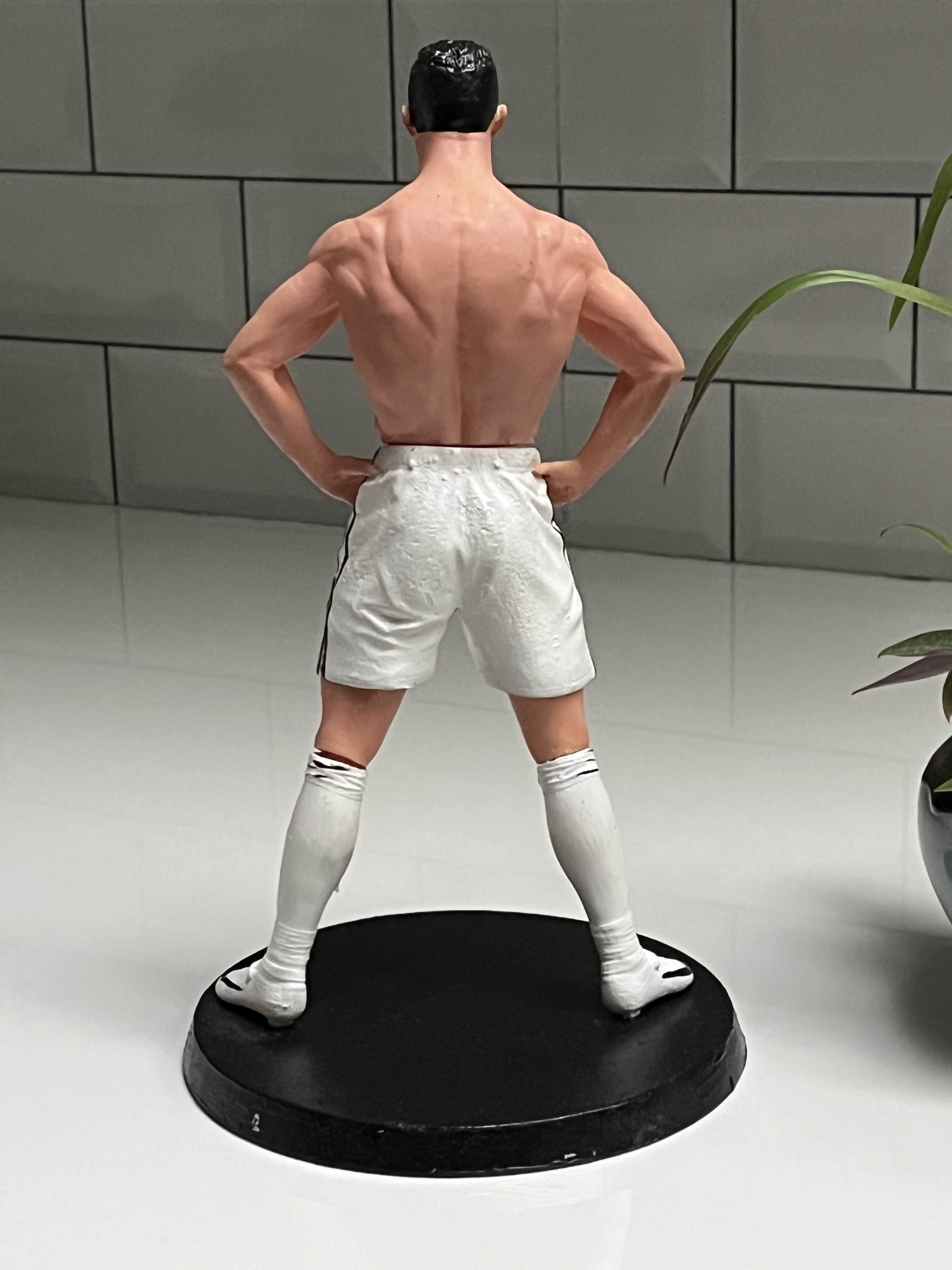 Celebration Pose Footballer Figurine – White Kit Collectible on Black Display Base